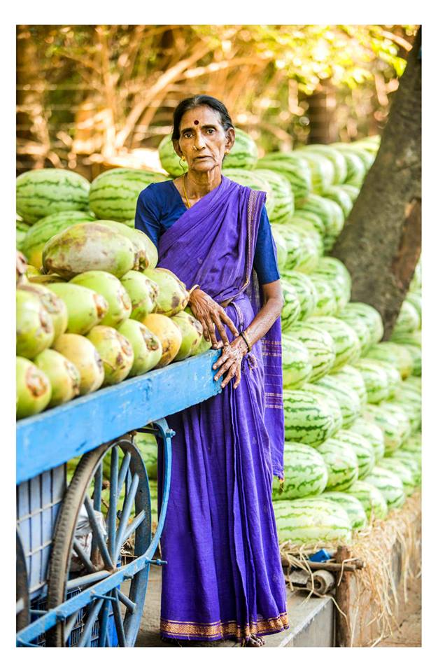 Krishnaveni sells tender coconut and seasonal fruits